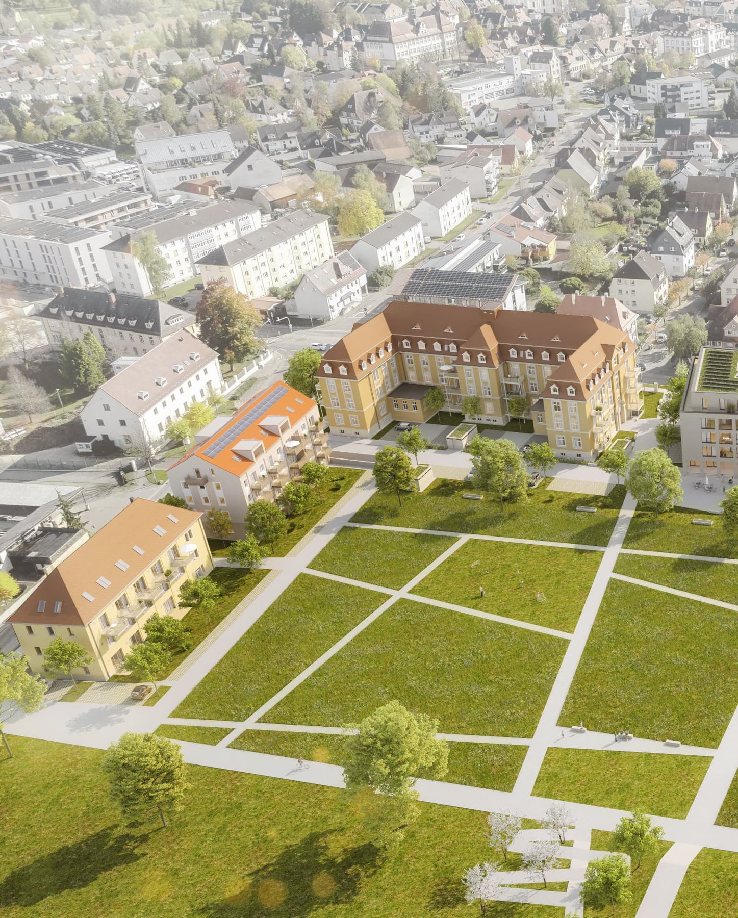 Visualisierung des denkmalgeschützten Bestandsgebäudes mit Parkfläche im André Noël Park